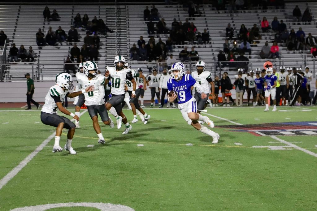 football player running with the ball